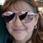 picture of lady wearing sunglasses